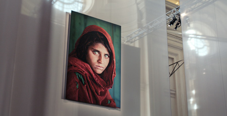The Afghan Girl, Steve McCurry’s most famous photograph, published in National Geographic in 1985, hangs centerstage in this exhibition celebrating his work in Turin, Italy